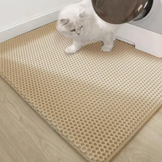 Alfombra atrapa arena beige de 55x75cm de la marca Mundotito, con textura suave y diseño funcional para la entrada del hogar.